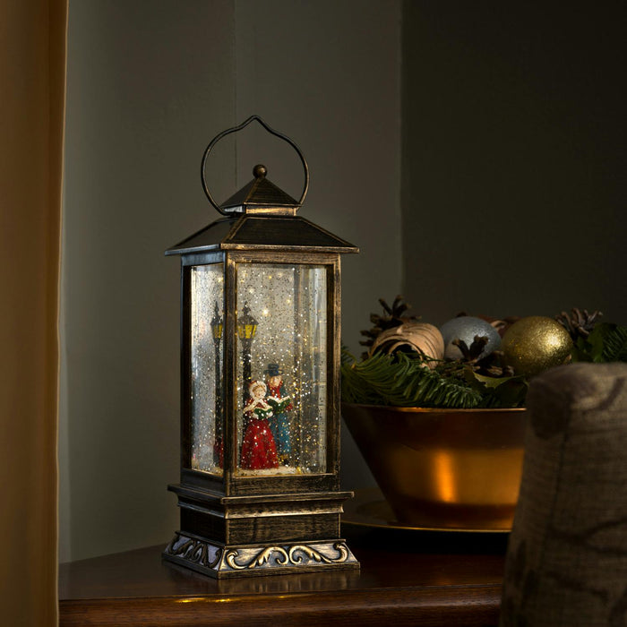 konstsmide water filled led lantern battery timer dickensian carol singers