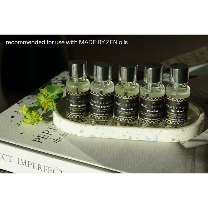 made by zen mercura white essential oil aroma diffuser in glass plug in