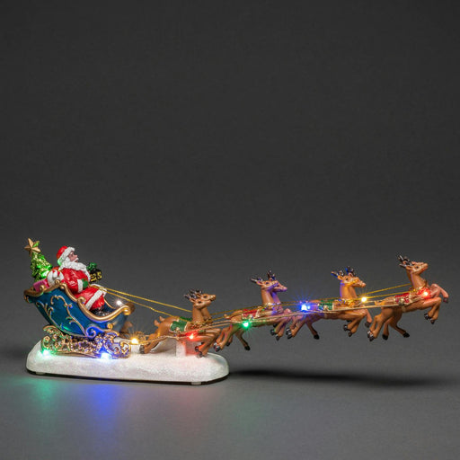 konstsmide led christmas scene santa in sleigh with flying reindeer battery